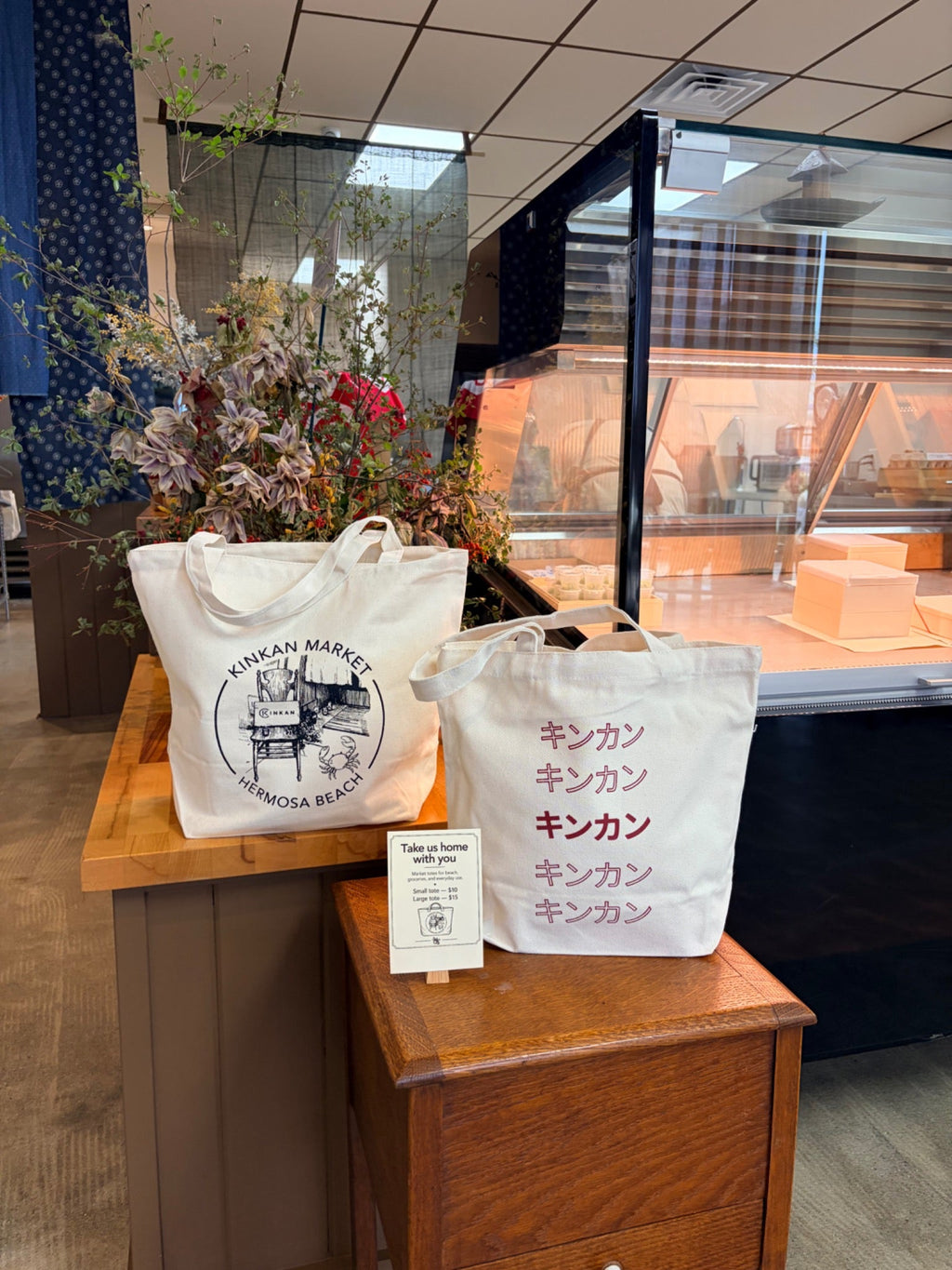 Kinkan Market tote bags displayed inside Kinkan Market
